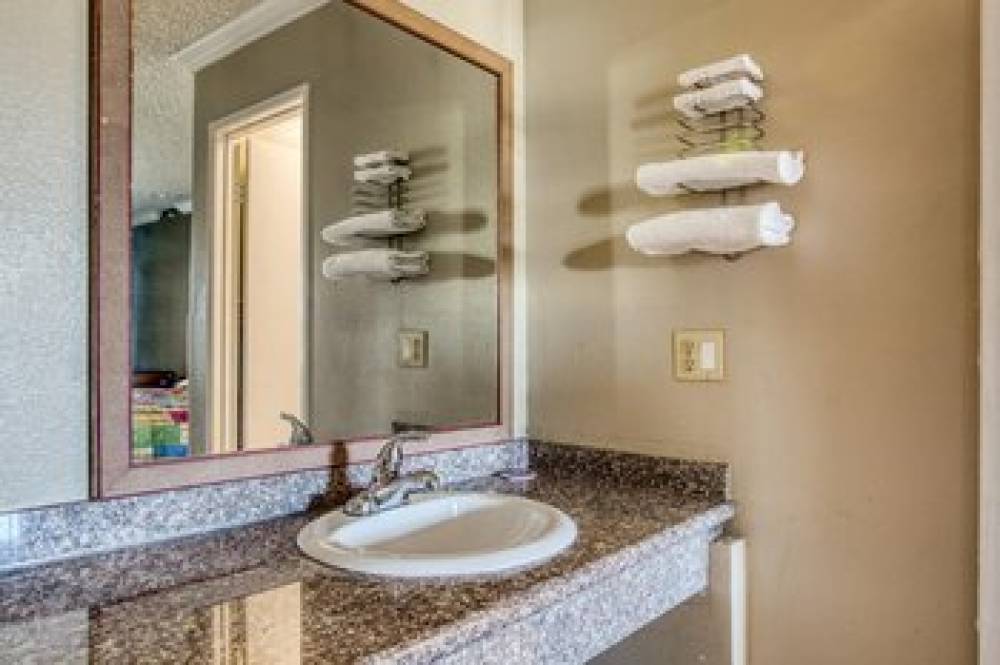 PASSPORT INN AND SUITES 9