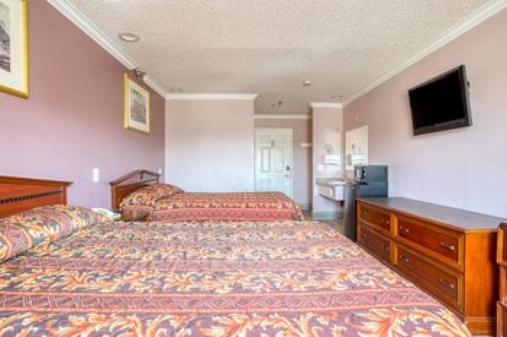 PASSPORT INN AND SUITES 5