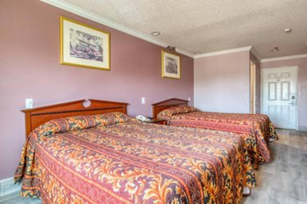 PASSPORT INN AND SUITES 6