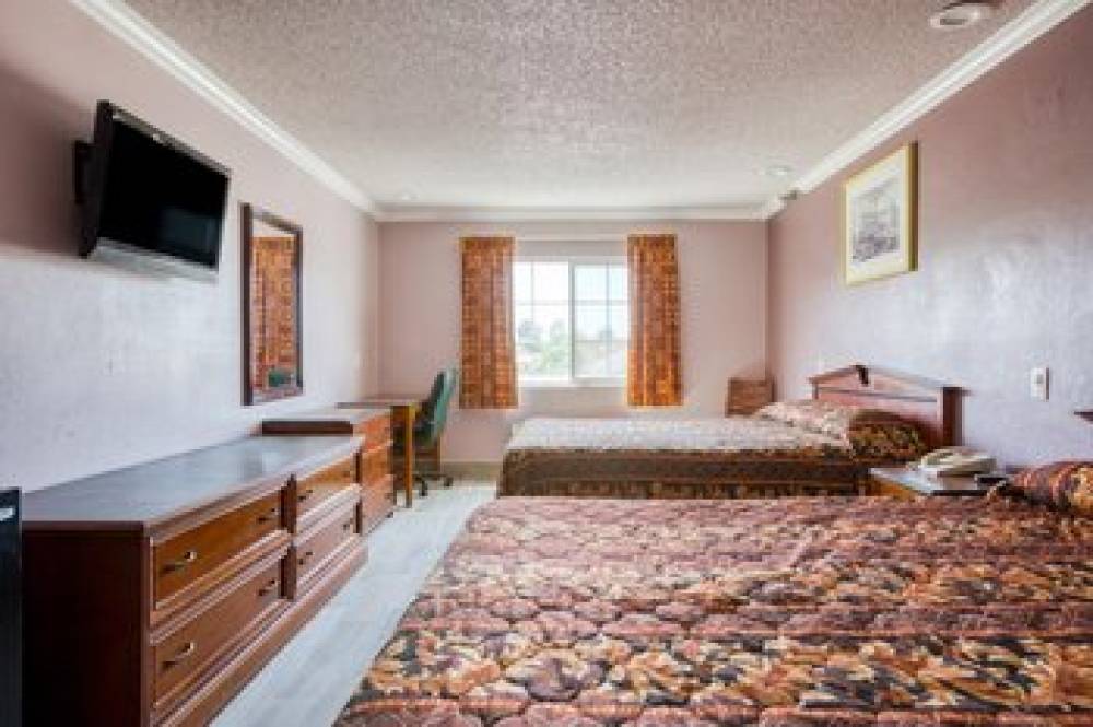 PASSPORT INN AND SUITES 7