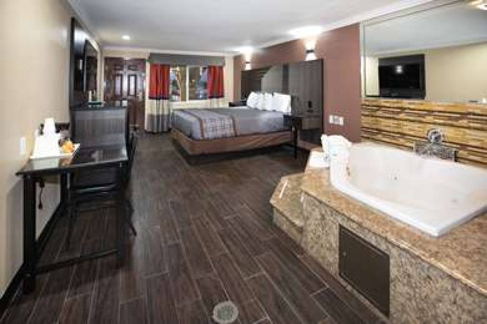 RODEWAY INN AND SUITES 8